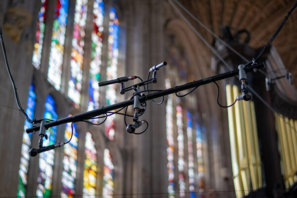 Microphones hung from the ceiling ready for the broadcast